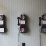 Radio Communication - minimalist photography of three crank phones